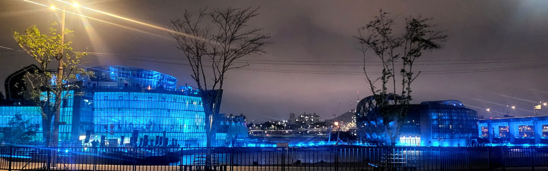 Sevit Floating Islands glowing blue, illuminating the night.